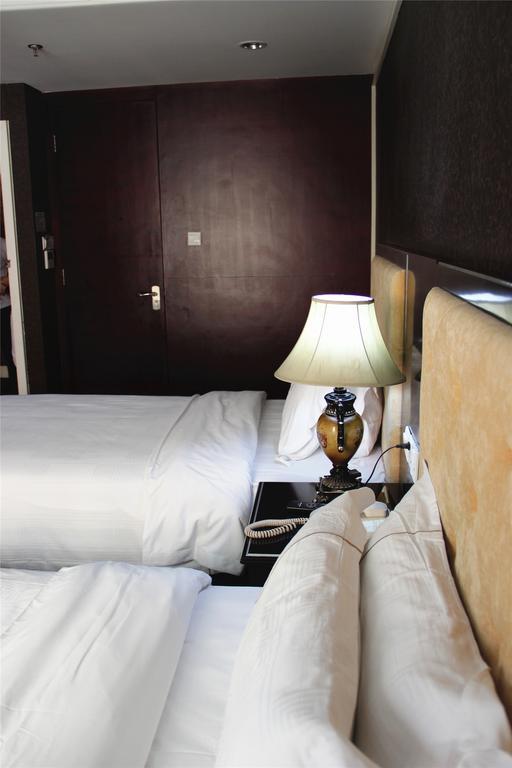 Manhattan Jinling Hotel Shanghai Chambre photo