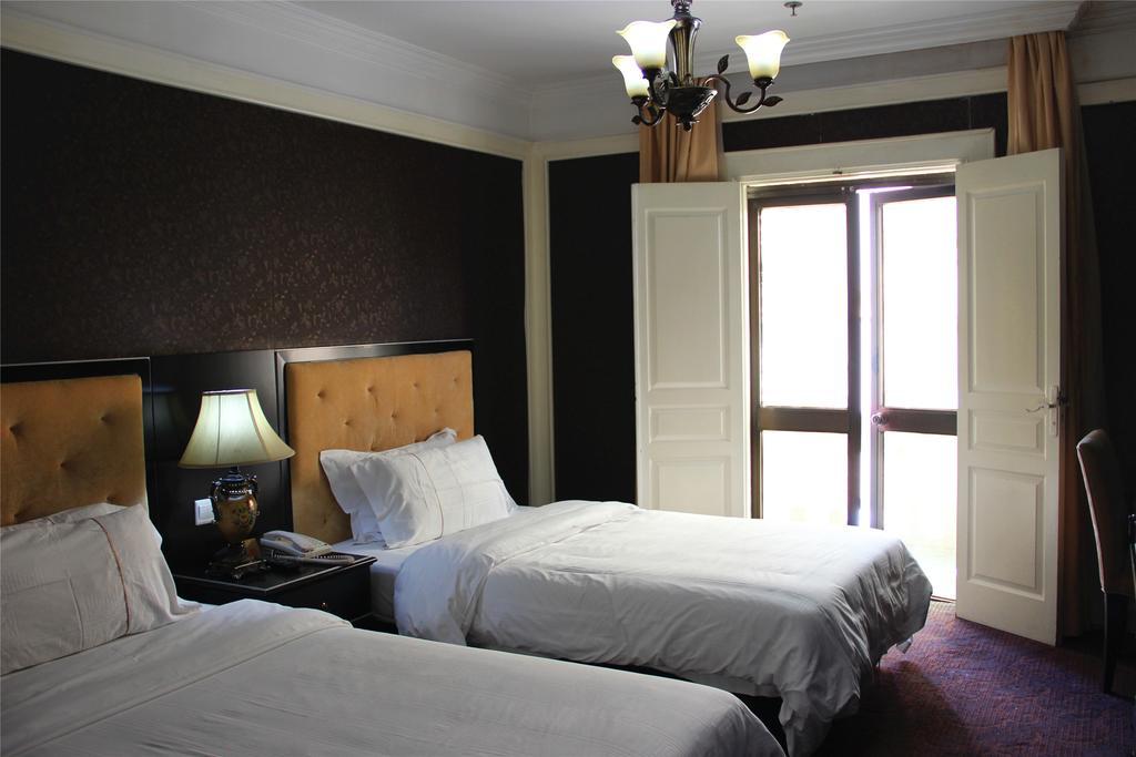Manhattan Jinling Hotel Shanghai Chambre photo