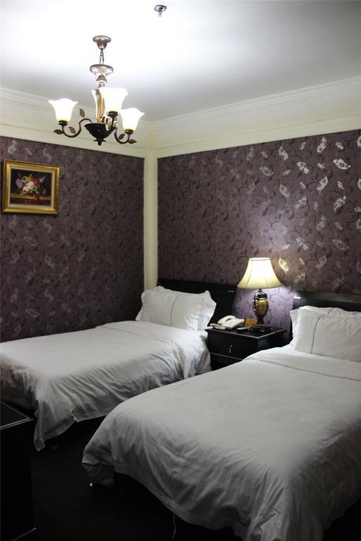 Manhattan Jinling Hotel Shanghai Chambre photo