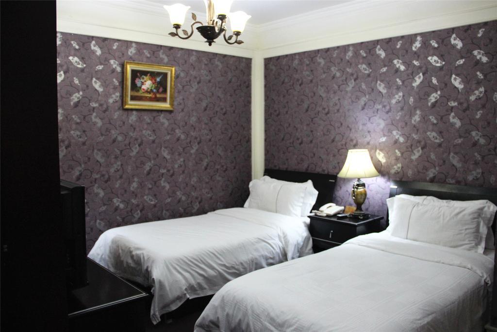 Manhattan Jinling Hotel Shanghai Chambre photo
